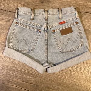 Light wash Wranger jean shorts. Premium Patch. Made in USA Size 5. High waisted